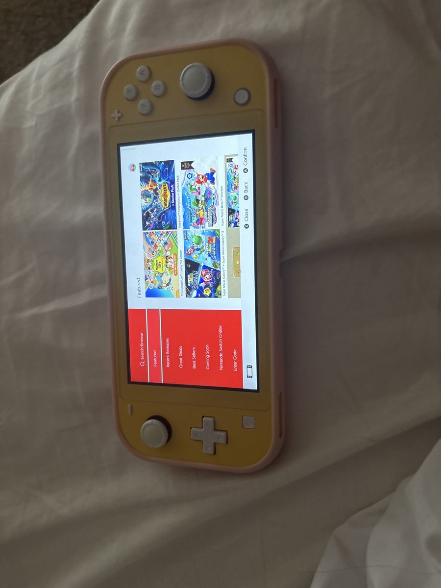 Used yellow nintendo switch lite