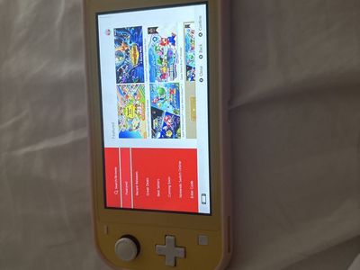 Used yellow nintendo switch lite