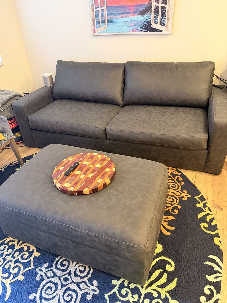 Dark Gray Sleeper Sofa with Matching Ottoman