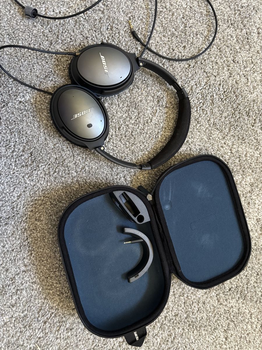 Bose noise canceling headphones with Bluetooth adapter