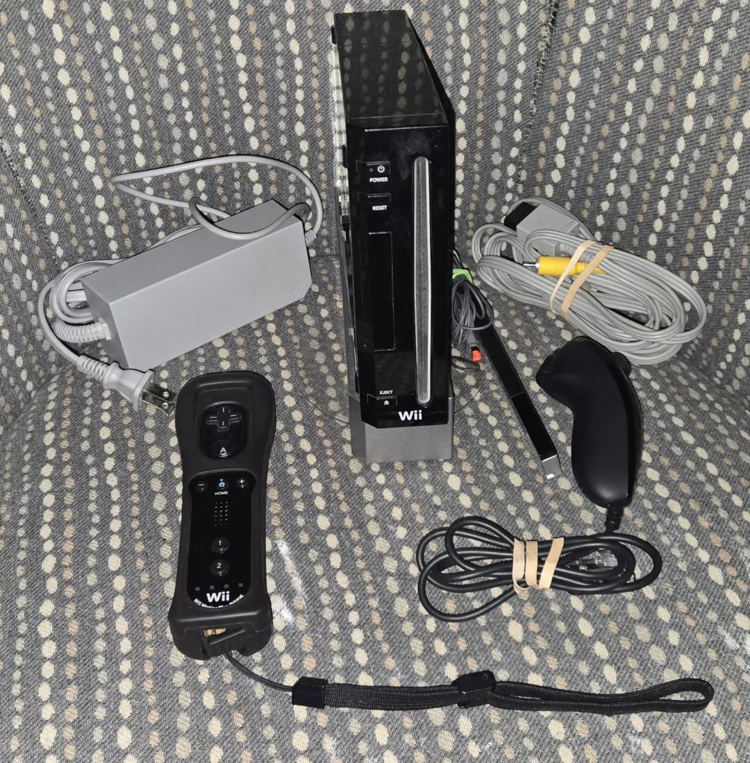 Backwards compatible Nintendo Wii with motionplus controller!  trades considered!