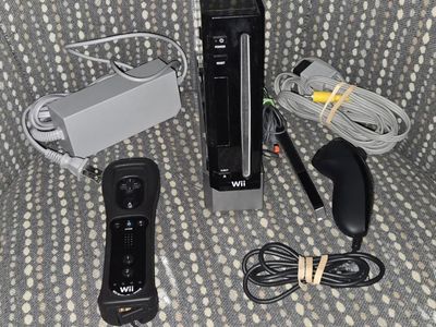 Backwards compatible Nintendo Wii with motionplus controller! trades considered!