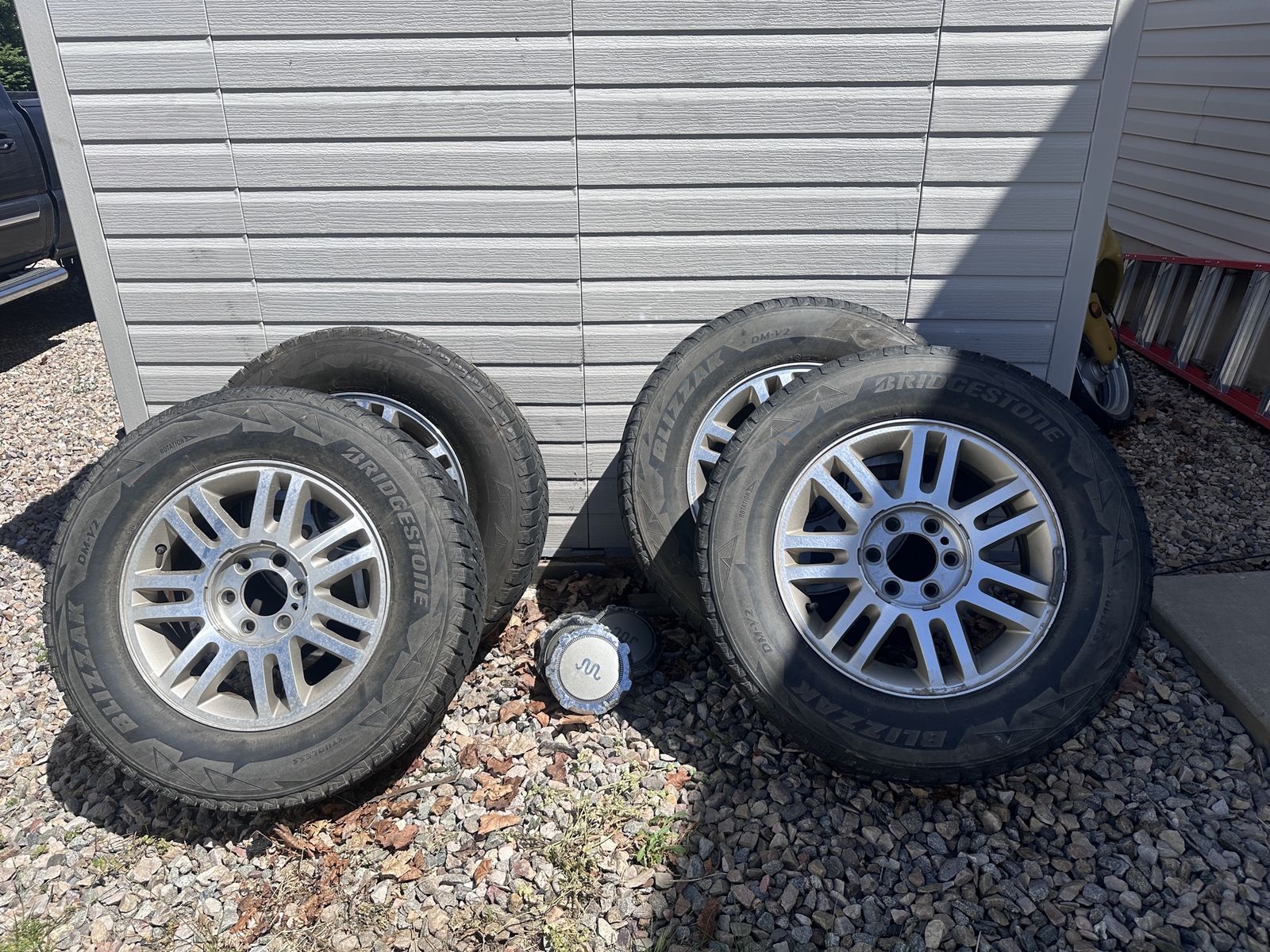Set of wheels and tires from 2009 Ford F150 King Ranch. 