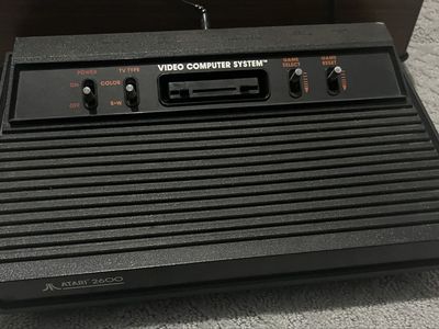 ATARI 2600 Video computer system with games and controllers