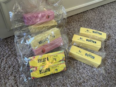Squishy yellow butter, pink strawberry, toast, cheese