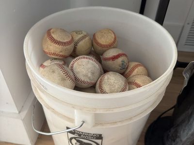 Bucket of baseballs