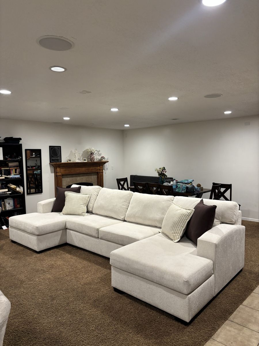 Large Beige Sectional Sofa with Double Chaises. 