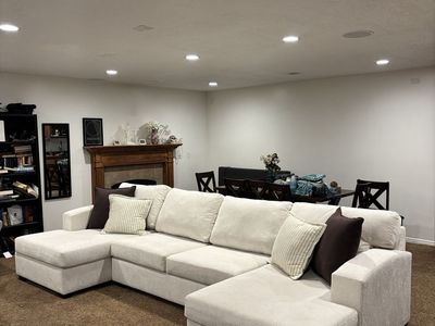 Large Beige Sectional Sofa with Double Chaises.