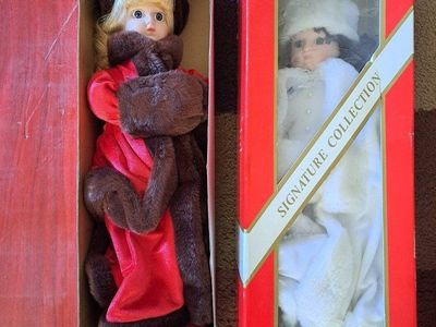 2 old porcelain dolls