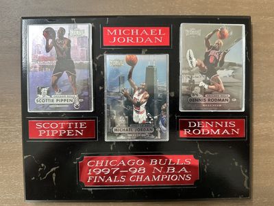 Authentic display plaque featuring genuine Metal Universe cards of the legendary Chicago Bulls championship trio: