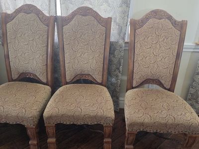 Ornate Carved Wooden Dining Chairs with Patterned Upholstery