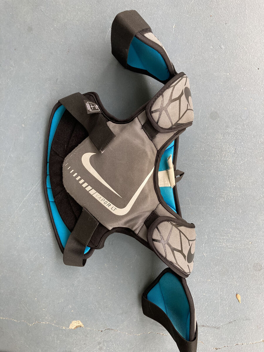 Lacrosse:  Nike VaporLT lacrosse shoulder and chest pad, meets NOCSAE standards Youth Medium