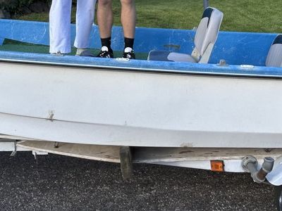 Fishing Boat, Trailer and 9.9 HP Motor