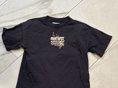 Zara says 6–7 grey T-shirt.