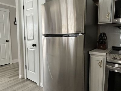 LG Refrigerator and top load freezer