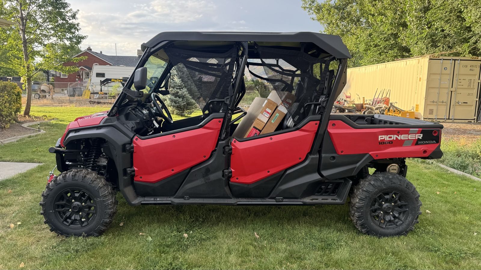 Honda Pioneer 1000-6 (only 14 miles) Deluxe Side-by-Side UTV - Red, 6-Seater