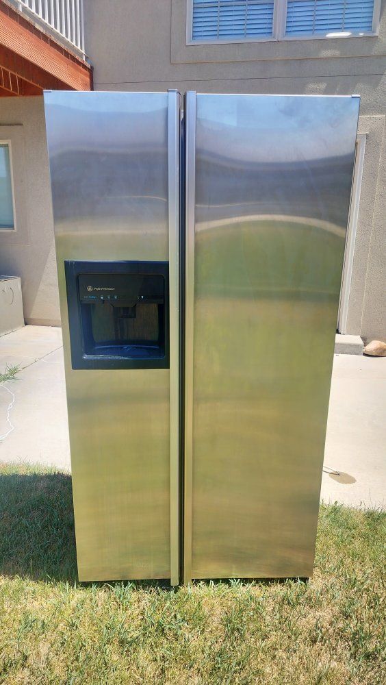 GE Profile Stainless Steel Side-by-Side Refrigerator with Ice & Water Dispenser