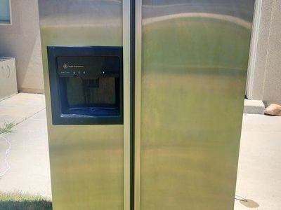 GE Profile Stainless Steel Side-by-Side Refrigerator with Ice & Water Dispenser