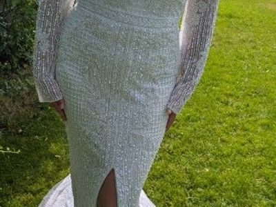 Hand beaded long sleeve wedding dress with train