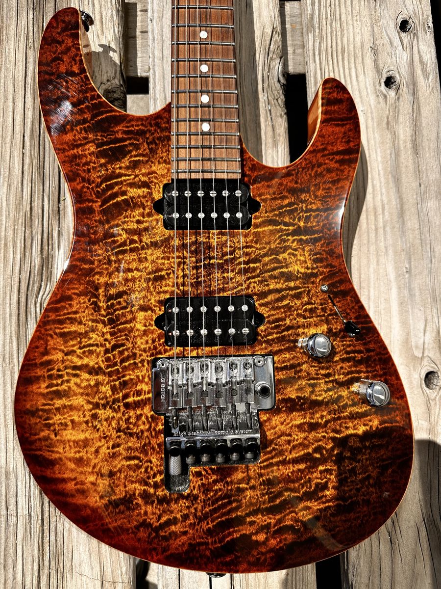 Suhr Modern Pro Bengal burst with D Tuna route. Absolutely gorgeous. Plays like a dream.