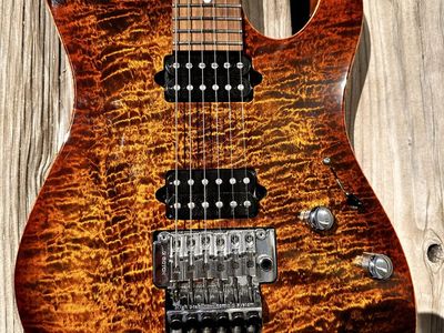 Suhr Modern Pro Bengal burst with D Tuna route. Absolutely gorgeous. Plays like a dream.