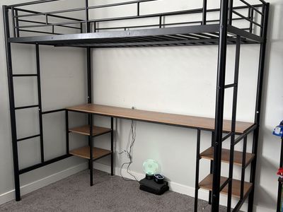 Twin metal loft bed with built in desk