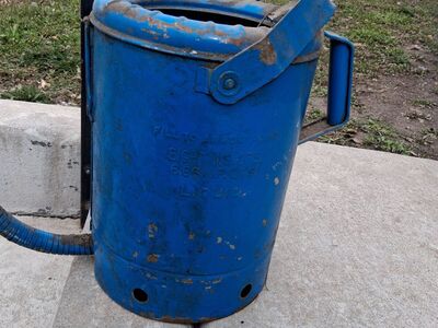 vintage 1950 oil can with flexible drain tube