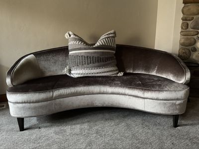 Curved velvet sofa