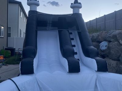 Used Inflatable Water Slide with Pool - Black & White, Great for Summer Fun