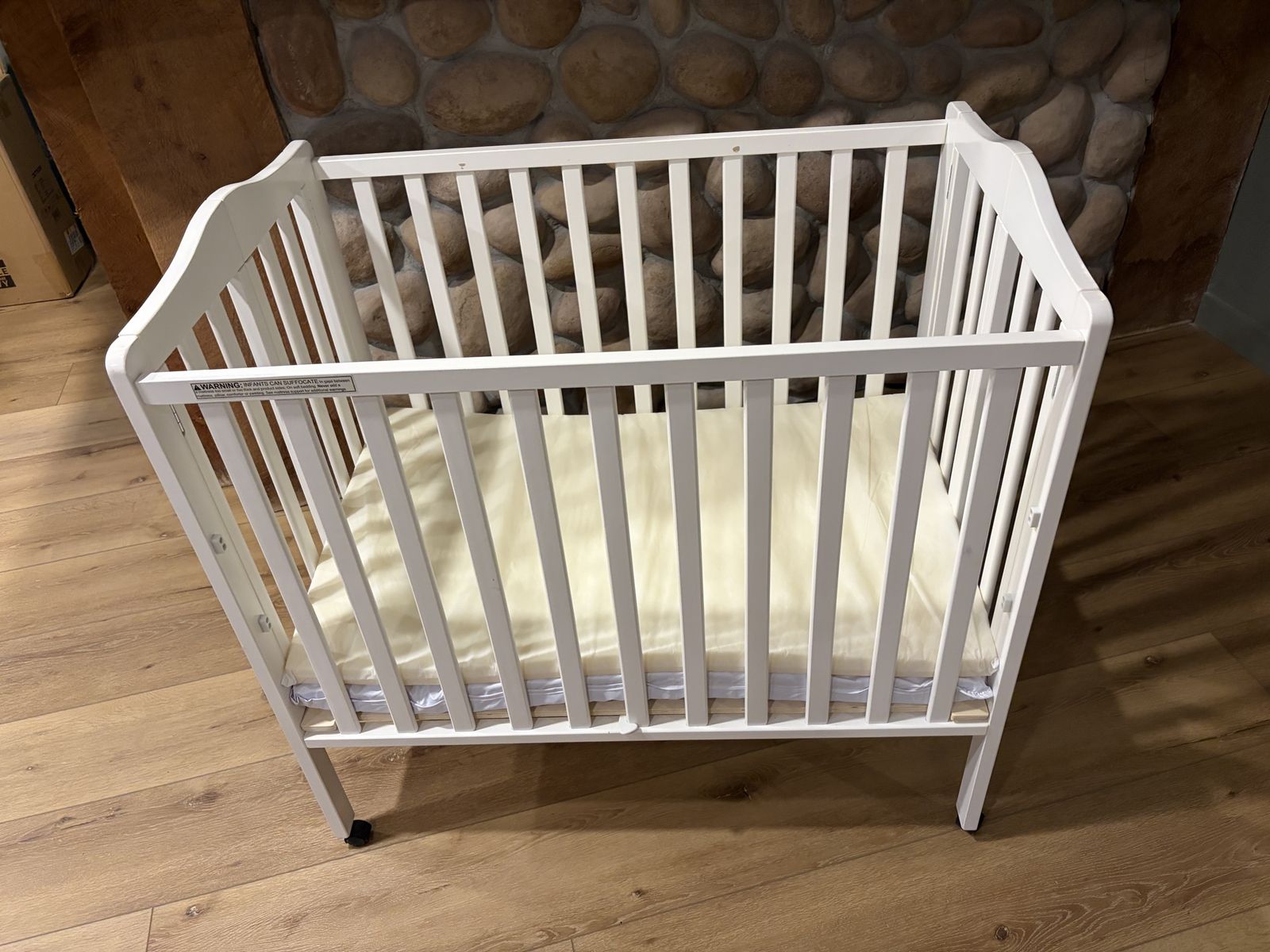 Delta Dream Portable Folding Mini Crib with Mattress