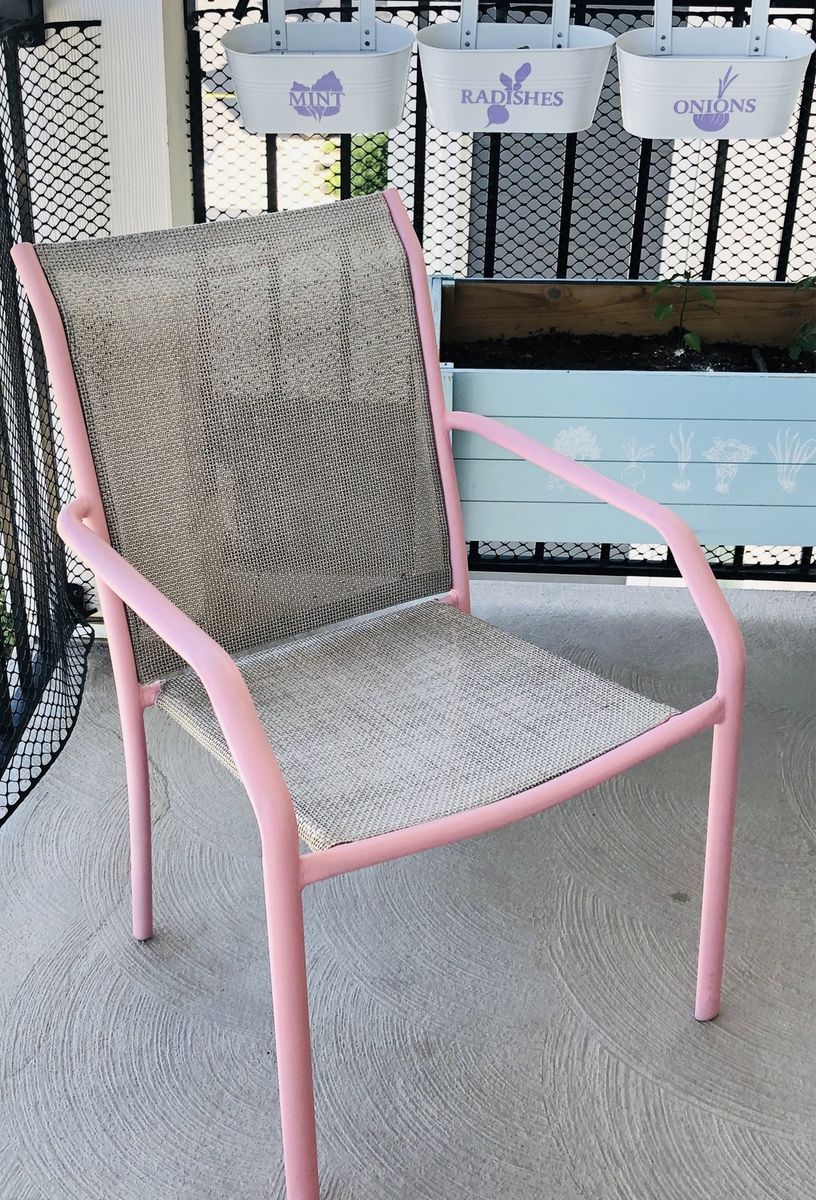 2 pink patio chairs