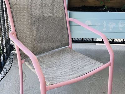 2 pink patio chairs