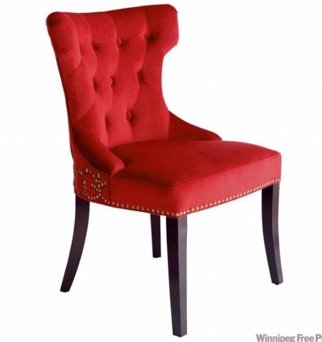 Red tufted velvet chairs