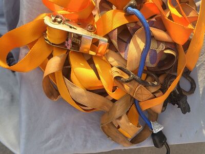 bundle of tie downs and ratchet straps
