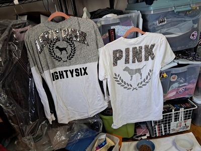 two Victoria secret shirts