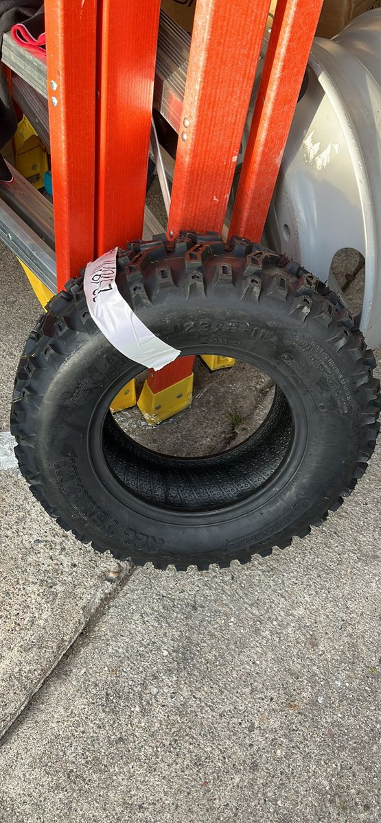 23X8-11 NEW DEESTONE TIRE