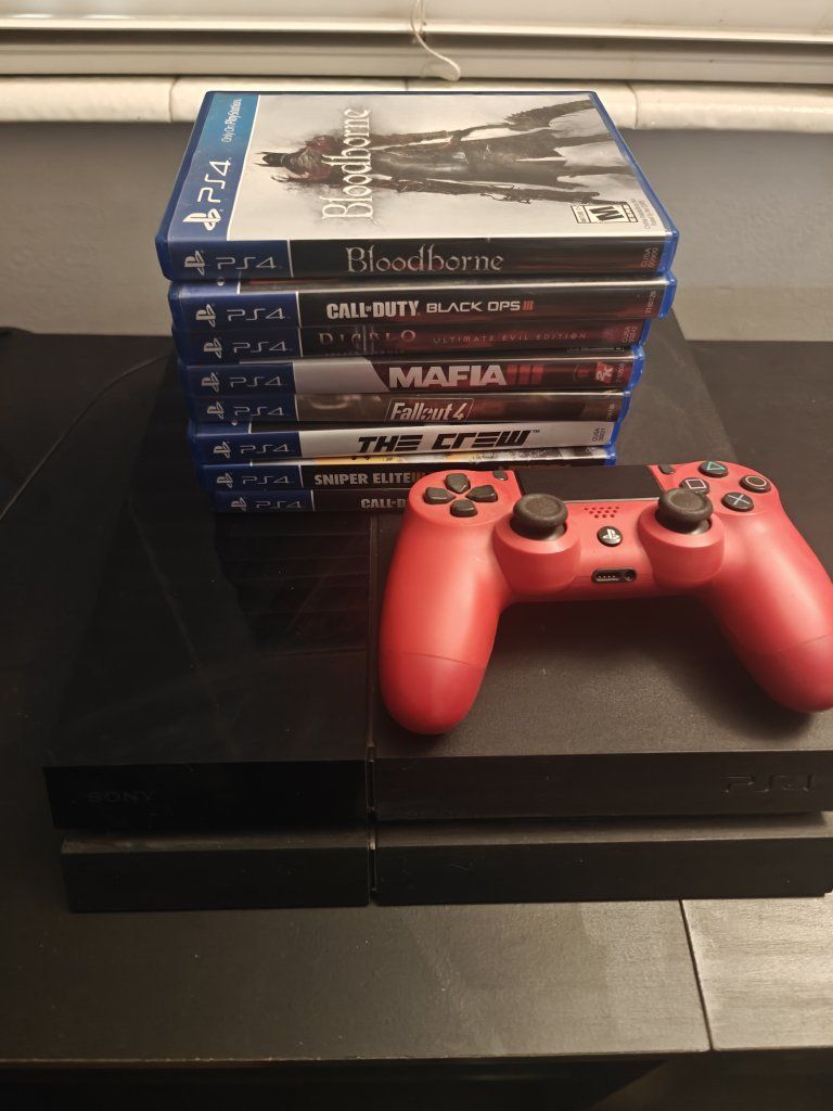 Sony PlayStation 4 Console Bundle with Red DualShock 4 Controller and 8 PS4 Games