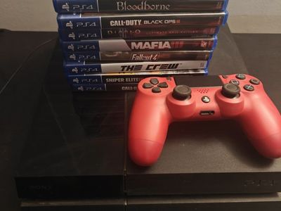 Sony PlayStation 4 Console Bundle with Red DualShock 4 Controller and 8 PS4 Games