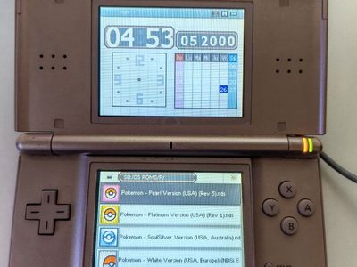 Nintendo ds lite rose gold with r4 cartridge