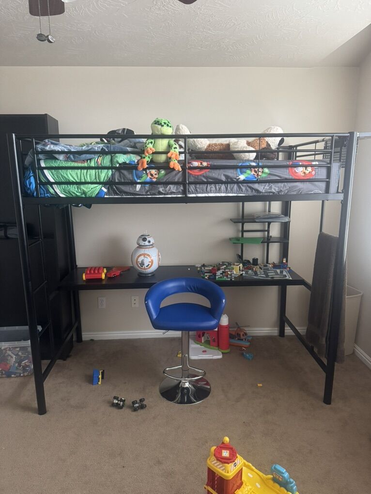 Twin loft bed with desk.
