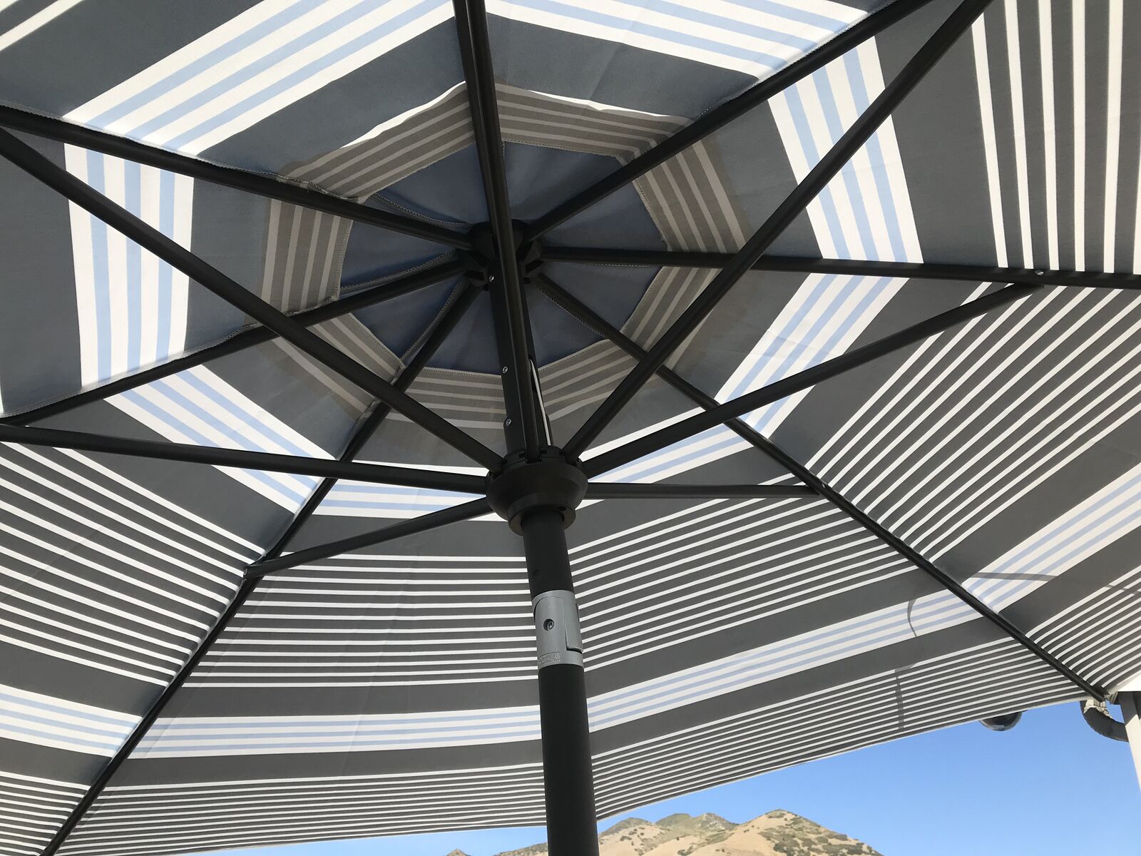 New 9 foot umbrella Stand is optional