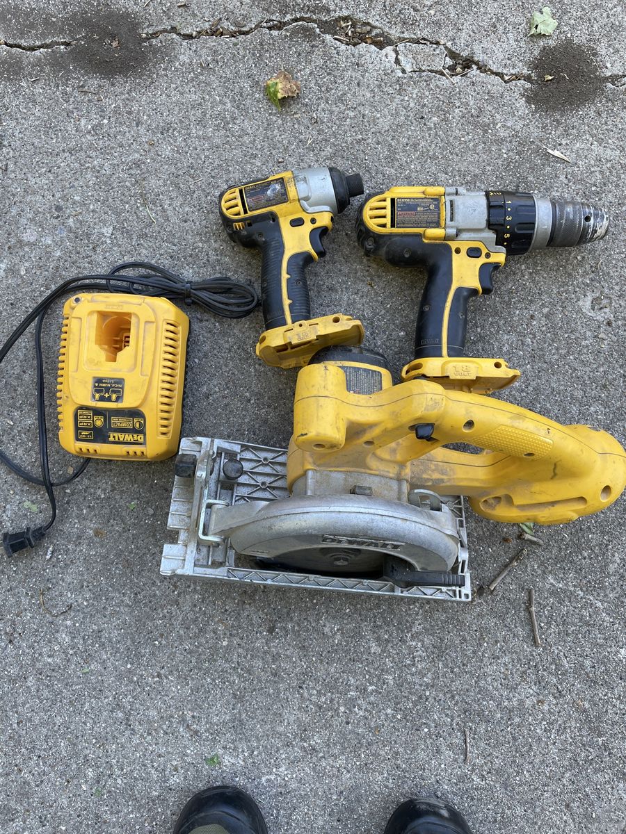 Dewalt 18v drill, impact, charger, and saw. No batteries