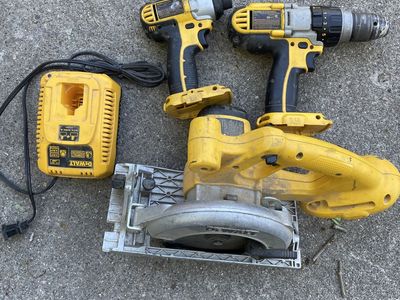 Dewalt 18v drill, impact, charger, and saw. No batteries