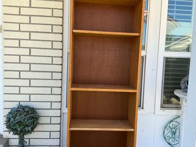 Brown wood bookshelf