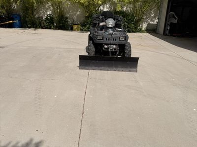 Polaris Sportsman 4x4 ATV with Plow and Rear Cargo Box - Great for All-Season Use