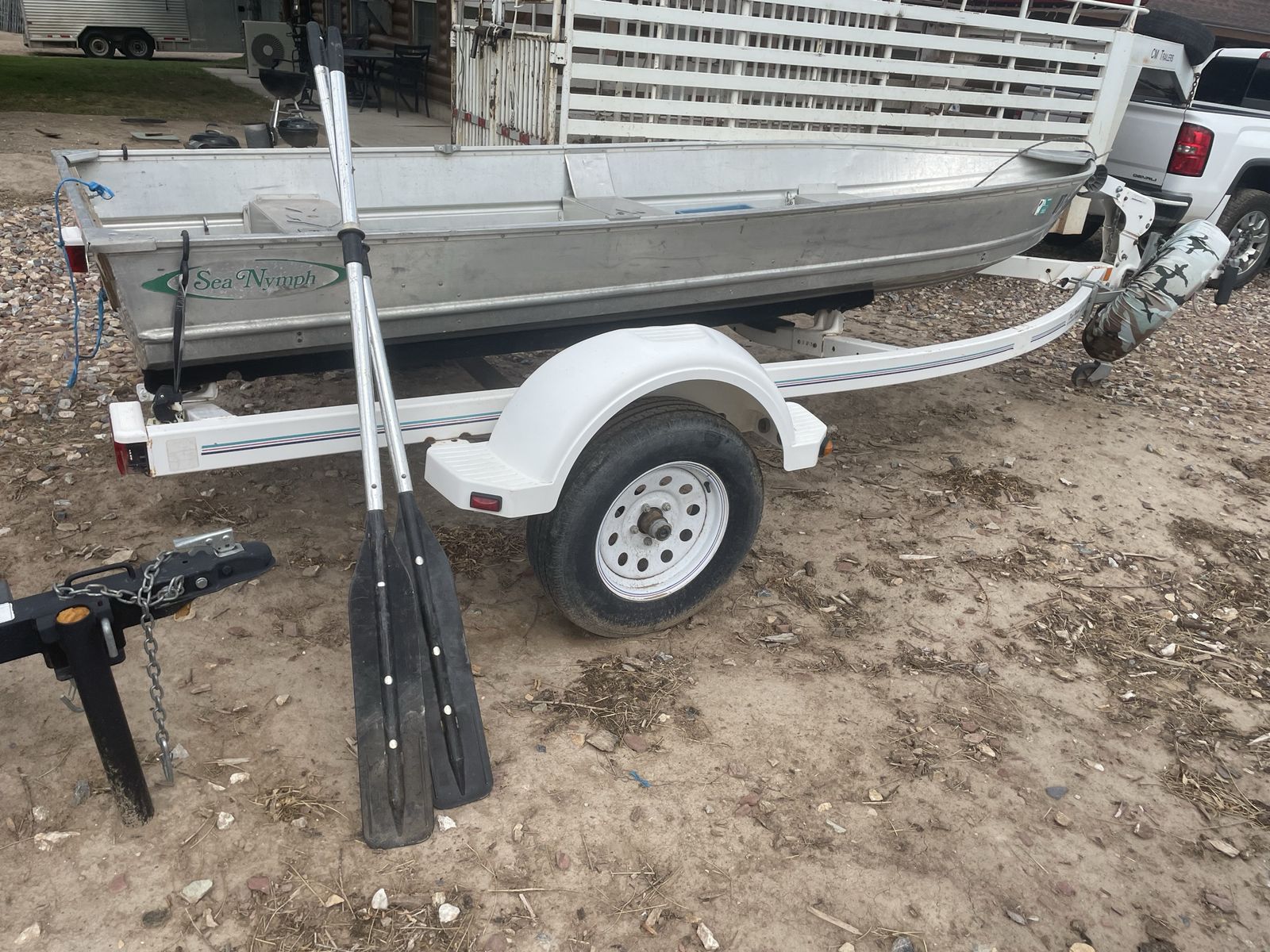 Sea Nymph Aluminum Jon Boat with Trailer and Oars two padded seats and two hard seats comes with trolling motor