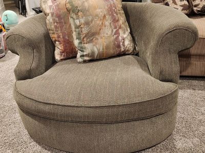 Large green "cuddle" chair