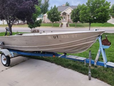 14 ft Gregor boat and trailer, welded aluminum