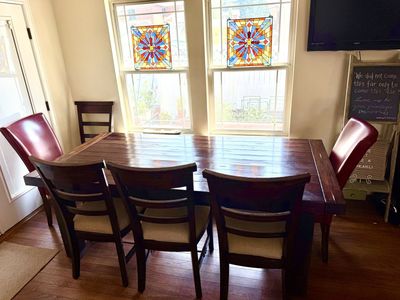 Five piece dining set with bonus chairs and inserts