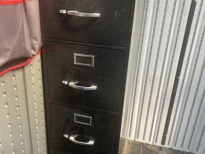 Sturdy 4 drawer metal filing cabinet.